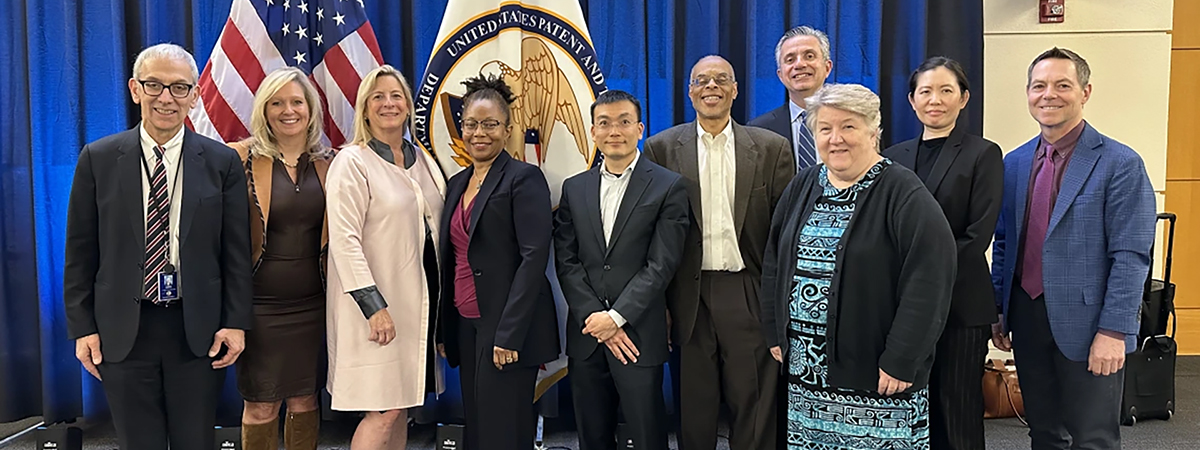 [The members of the PPAC at their Fall 2024 meeting in Washington, DC. From left to right: Dr. Marvin Slepian, Heidi Nebel, Suzanne Harrison, Loletta Darden, Charles Duan, Lateef Mtima, Henry Hadad, Kathleen Duda, Olivia Tsai, and Earl “EB” Bright.]