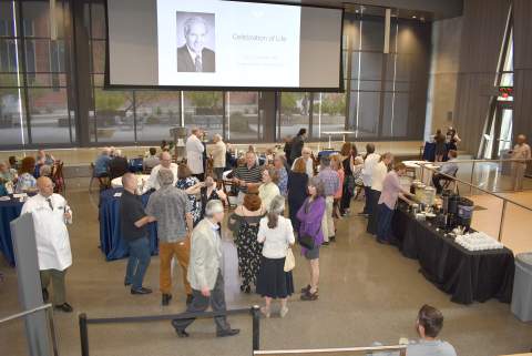 Family and friends of the late Dr. John T. "Jack" Boyer gather in HSIB Forum of the Health Sciences Innovation building to celebtrate his life.