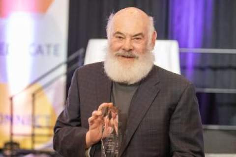 Andrew Weil, MD, with the Statuette presented to Dr. Andrew Weil for Integrative Healthcare Symposium 2022 Leadership Award (Courtesy Integrative Healthcare Symposium)