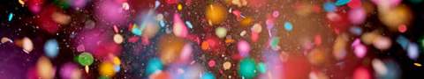 Image of colorful confetti flying through the air.