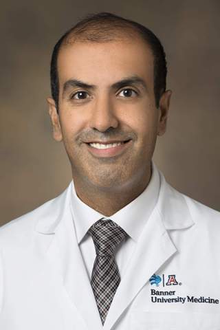 Image of Puneet Shroff, MD, in physician's white coat