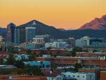 [Sunset image of A Mountain as viewed across the UofA campus and downtown Tucson]