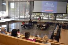 [Jennifer Carew, PhD, welcomes Translational Medicine Symposium attendees and introduces opening keynote speaker Northwestern University’s Devalingam Mahalingam, MD, PhD, who spoke on oncolytic virotherapy.]