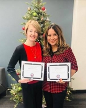 Michele Dalmendray and Barbra Solares with certificates of recognition as GME Administrators Liaison appointees