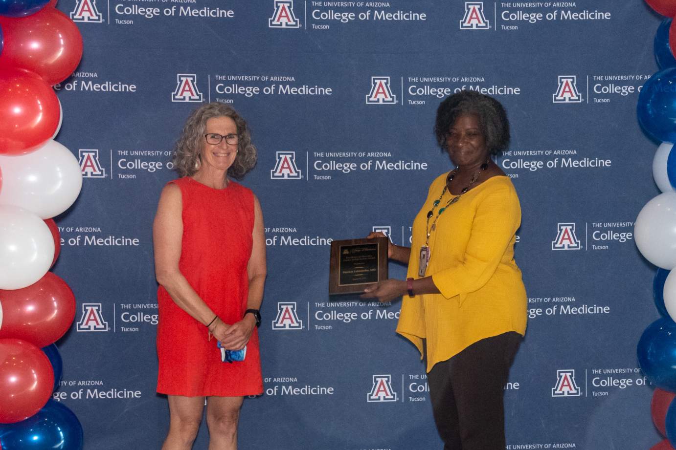 [Dr. Patricia Lebensohn is presented with the Awards for Excellence in Diversity, Equity, and Inclusion by Dr. Victoria Murrain.]
