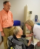 Dr. Monica Vandivort seeing a patient and her son in clinic at Banner - UMC Tucson