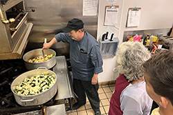 Executive Chef David Sullivan prepares a meal at the Hacienda at the River retirement community.