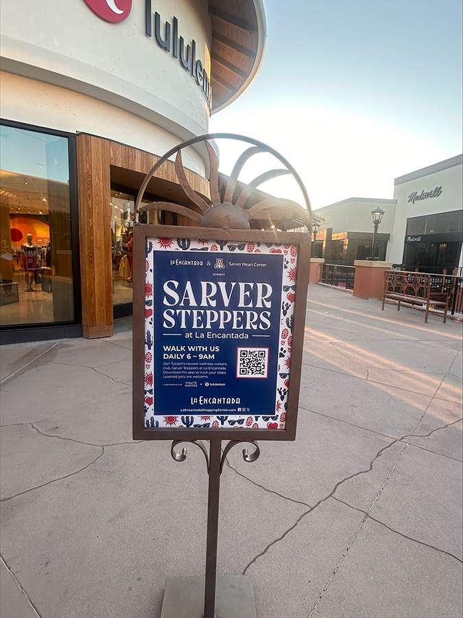 [Signage at La Encantada Shopping Center promoting its new Sarver Steppers walking club]