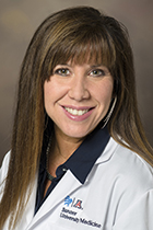 [Dr. Amy Sussman, pictured here, was named the 2024 Outstanding Teacher in the Clinical Sciences and the Leonard Tow Humanism in Medicine Award winner by University of Arizona College of Medicine – Tucson graduating students.]