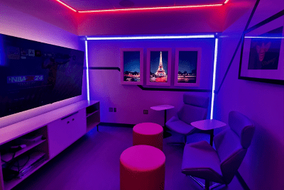 [The new Diamond Children's respite room for teen oncology patients displaying an image of the Eiffel Tower just in time for the 2024 Summer Olympics in Paris]