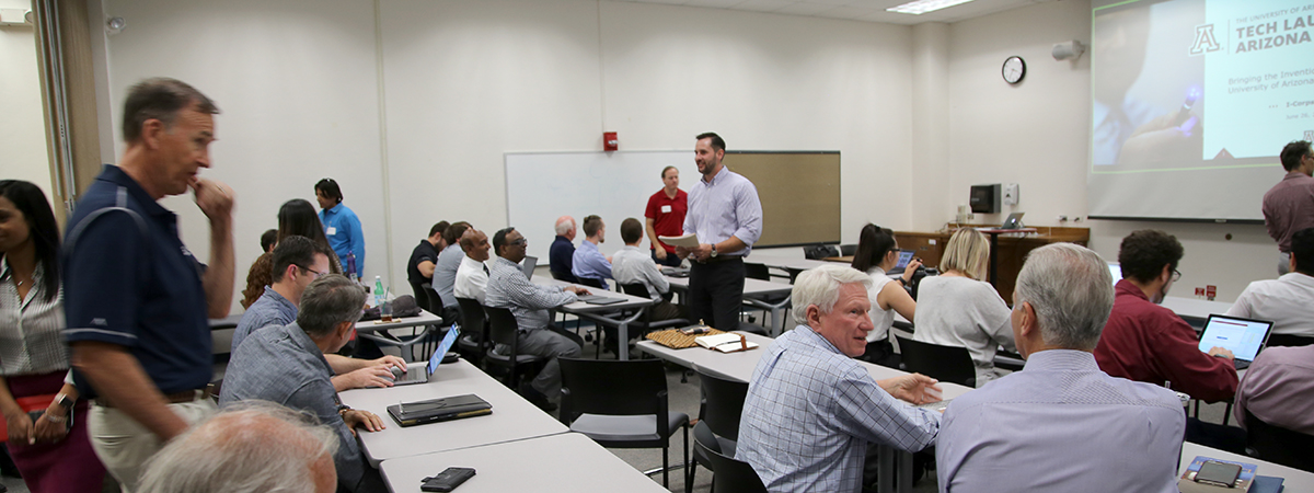 Commercialization Network Manager Eric Smith addresses a gathering of students for I-Corps, one of TLA's programs to prepare startup teams for success. (Photo: Paul Tumarkin/Tech Launch Arizona)