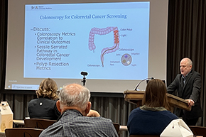 [UArizona gastroenterologist Dr. Josh Melson presents on colorectal cancer screening at the TMC Internal Medicine Grand Rounds in the hospital’s Marshall Auditorium on April 5.]