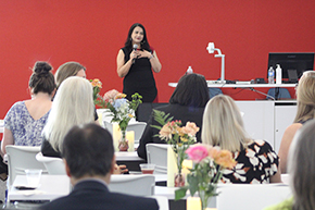 [WIMS Assistant Dean Dr. Hina Arif welcomes guests to the 2024 Torchbearer Awards and introduces the keynote speaker.]