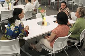 [Division of Dermatology Chief Dr. Clara Curiel-Lewandrowski (left) and Dr. Lisa Alschuler join conversation with two other physicians at the Torchbearer Awards event Sept. 10 at HSIB 305.]