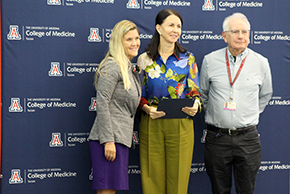 [Dermatology’s Dr. Clara Curiel-Lewandrowski with Banner – University Medicine Tucson CMO Dr. Bethany Bruzzi and Dr. Bruce Coull, College of Medicine – Tucson vice dean for faculty affairs.]