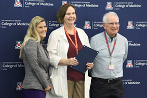 [Infectious Diseases’ Dr. Liz Connick with Banner – University Medicine Tucson CMO Dr. Bethany Bruzzi and Dr. Bruce Coull, College of Medicine – Tucson vice dean for faculty affairs.]