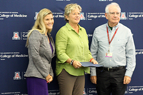 [Professor of medicine and AWCIM Fellowship in Integrative Medicine associate program director Dr. Lisa Alschuler with Banner – University Medicine Tucson CMO Dr. Bethany Bruzzi and Dr. Bruce Coull, College of Medicine – Tucson vice dean for faculty affairs.]