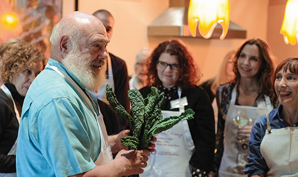 [Dr. Andrew Weil demonstrates how to make his kale salad.]